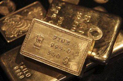 Фьючерсы на золото подешевели во время азиатских торгов - smartmoney.one - США - Reuters