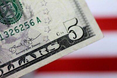 Средний курс доллара США со сроком расчетов "завтра" по итогам торгов составил 56,8904 руб. - smartmoney.one - США - Reuters