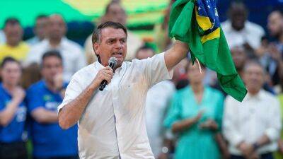 Жаир Болсонару - Тема огнестрельного оружия может стать одной из главных на выборах президента Бразилии - ru.euronews.com - Бразилия - Сан-Паулу